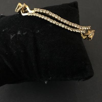 Beautiful, gold tone, rhinestone bangle bracelet