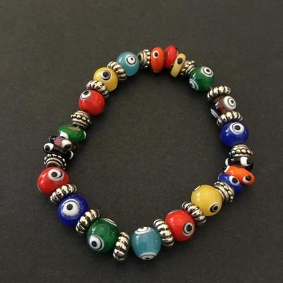 Vintage glass bead, evil eye stretch bracelet