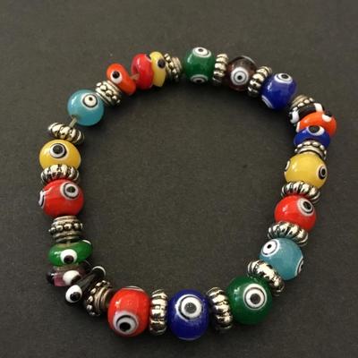 Vintage glass bead, evil eye stretch bracelet
