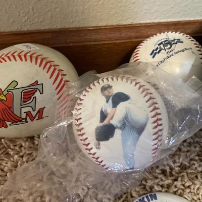 Footballs, baseball baseballs, and pins