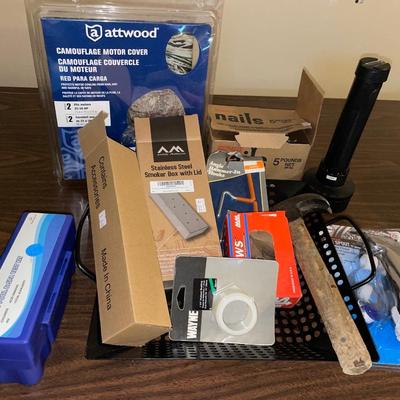 Hammer, nails and motor cover