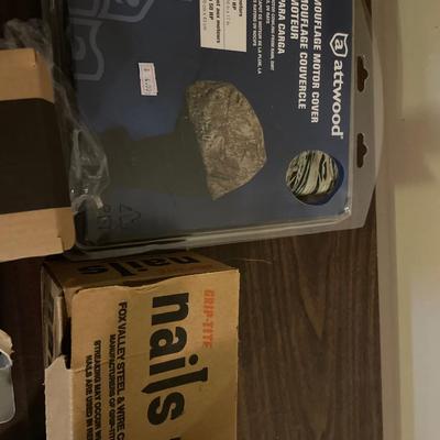 Hammer, nails and motor cover