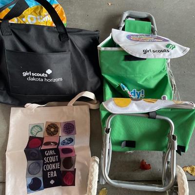 Girl Scout cookies carrying tote with signs and bags
