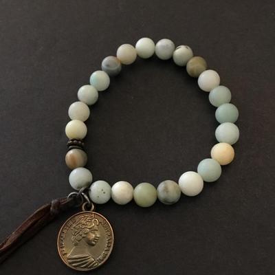 Beautiful stone bead bracelet with tassel & faux coin charm