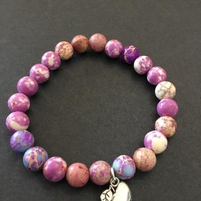 Beautiful, pink and purple stone bead bracelet with Apple charm