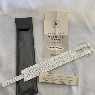 Sale Photo Thumbnail #164: Sterling Decimal Trig Log-Log Slide Rule with its instruction manual and case.