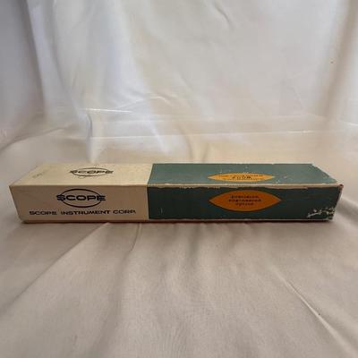 Sale Photo Thumbnail #167: vintage telescope, likely a refractor model, from the brand "SCOPE" by Scope Instrument Corp.