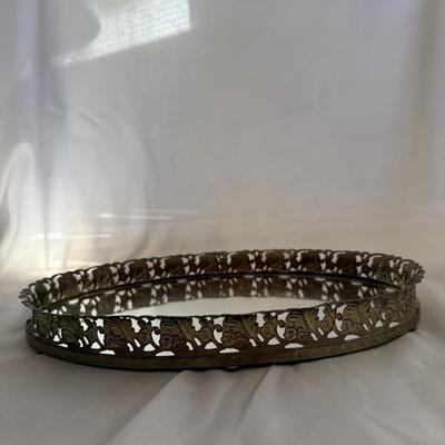 Sale Photo Thumbnail #222: Vintage oval gold-tone filigree mirrored vanity tray.