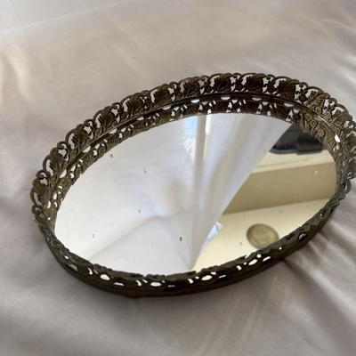 Sale Photo Thumbnail #221: Vintage oval gold-tone filigree mirrored vanity tray.