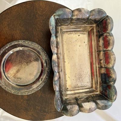 Sale Photo Thumbnail #234: Small Silverplate tray/wine coaster 
Vintage silver-plated scalloped footed bowl.