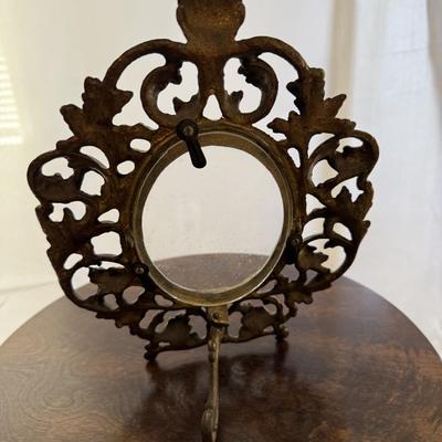 Sale Photo Thumbnail #243: Cast iron gilt table top picture frame