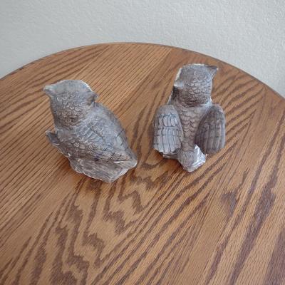 GLIDER, FAUX FLORAL SWAG AND A SIDE TABLE