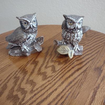 GLIDER, FAUX FLORAL SWAG AND A SIDE TABLE