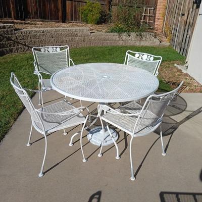 WROUGHT IRON PATIO TABLE WITH 4 CHAIRS