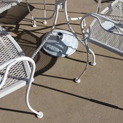 WROUGHT IRON PATIO TABLE WITH 4 CHAIRS