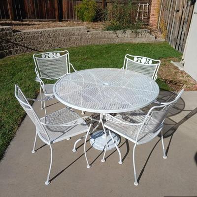 WROUGHT IRON PATIO TABLE WITH 4 CHAIRS