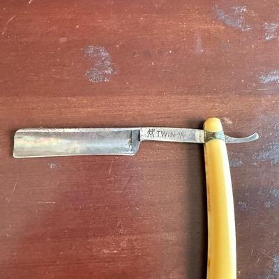 Sale Photo Thumbnail #256: Vintage J.A. Henckels "Twin" straight razor. Used by the barber in the Cape Fear Hotel in the 40s