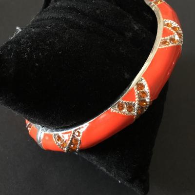 Very nice silver tone, orange enamel rhinestone, hinged bangle bracelet
