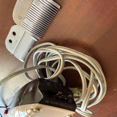 Sale Photo Thumbnail #271: Vintage Raycine electric hair clipper, Model 254.