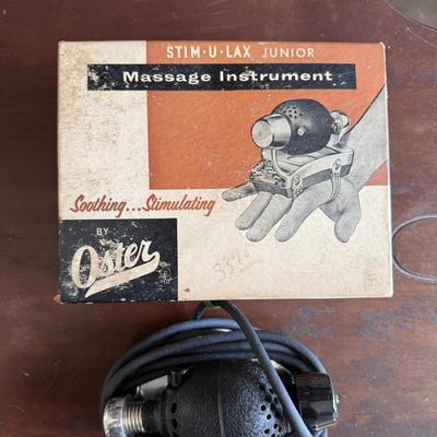 Sale Photo Thumbnail #275: 1950s handheld vibrating device that barbers would wear to provide a massage