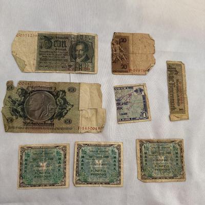 Sale Photo Thumbnail #231: 1 - 50 Reichsmark banknote 1933
1 - 10 Reichsmark banknote 1929
3 - 1/2 Mark Allied Military currency in occupied Germany WW II