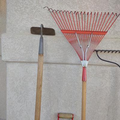 SLEDGE HAMMER, YARD TOOLS AND A SHEPHERDS HOOK