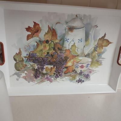 CANISTER SET AND A SERVING TRAY