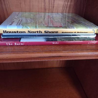 BOOKCASE WITH A VARIETY OF BOOKS