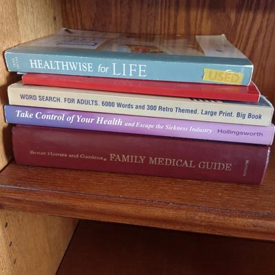 BOOKCASE WITH A VARIETY OF BOOKS