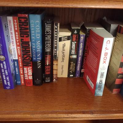 AN ASSORTMENT OF BOOKS