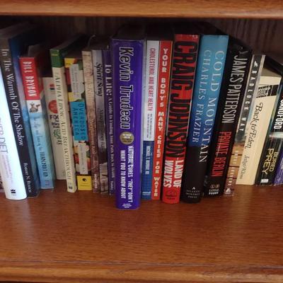 AN ASSORTMENT OF BOOKS