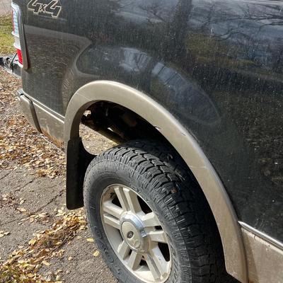 Sale Photo Thumbnail #24: 2004 Ford F150 Cobra Jet Lariat 5.4 Triton 64,500 miles! ﻿video of it running is on our Facebook page or can be sent upon request. You are able to come and view the truck as well. Battery is non functioning, requires a jump.