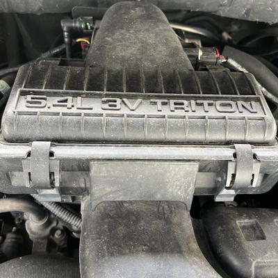 Sale Photo Thumbnail #12: 2004 Ford F150 Cobra Jet Lariat 5.4 Triton 64,500 miles! ﻿video of it running is on our Facebook page or can be sent upon request. You are able to come and view the truck as well. Battery is non functioning, requires a jump.