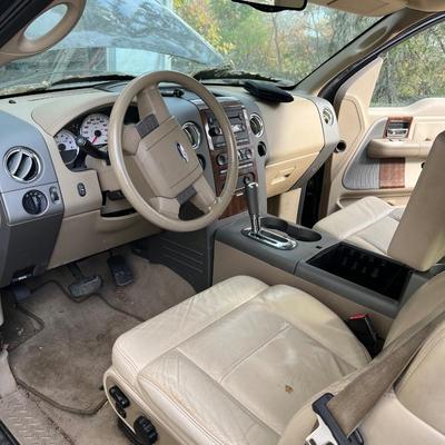 Sale Photo Thumbnail #2: 2004 Ford F150 Cobra Jet Lariat 5.4 Triton 64,500 miles! ﻿video of it running is on our Facebook page or can be sent upon request. You are able to come and view the truck as well. Battery is non functioning, requires a jump.