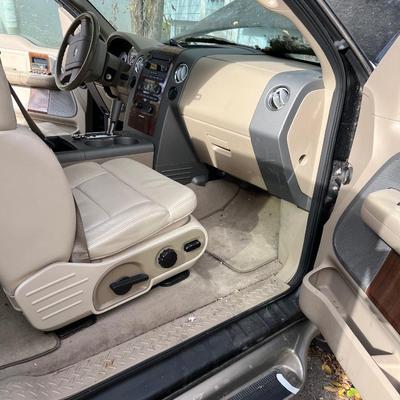 Sale Photo Thumbnail #18: 2004 Ford F150 Cobra Jet Lariat 5.4 Triton 64,500 miles! ﻿video of it running is on our Facebook page or can be sent upon request. You are able to come and view the truck as well. Battery is non functioning, requires a jump.