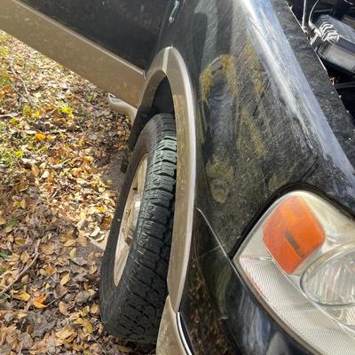 Sale Photo Thumbnail #13: 2004 Ford F150 Cobra Jet Lariat 5.4 Triton 64,500 miles! ﻿video of it running is on our Facebook page or can be sent upon request. You are able to come and view the truck as well. Battery is non functioning, requires a jump.