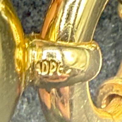 Sale Photo Thumbnail #175: 8-strand freshwater seed pearl necklace with a 14K gold clasp. Clasp is marked "ADPG" and "14K". Overall necklace weight is 55g.  Excellent condition.