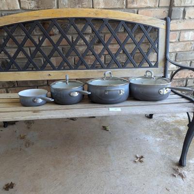 Sale Photo Thumbnail #222: bench in the background is not part of the lot this is for the cookware only