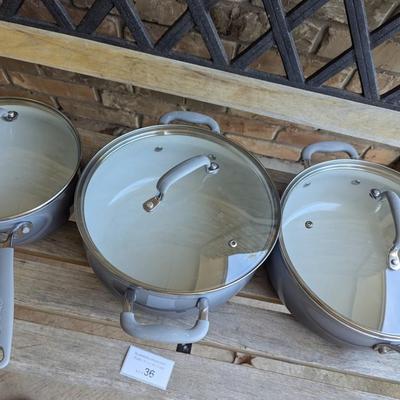 Sale Photo Thumbnail #224: bench in the background is not part of the lot this is for the cookware only