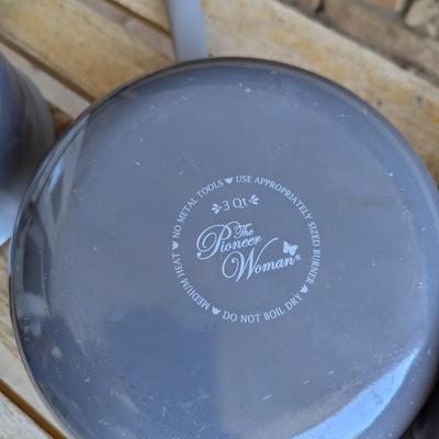 Sale Photo Thumbnail #229: bench in the background is not part of the lot this is for the cookware only