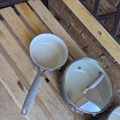 Sale Photo Thumbnail #226: bench in the background is not part of the lot this is for the cookware only