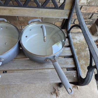 Sale Photo Thumbnail #223: bench in the background is not part of the lot this is for the cookware only