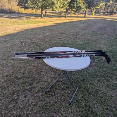 Sale Photo Thumbnail #293: HOCKEY STICKS  the table is not included.