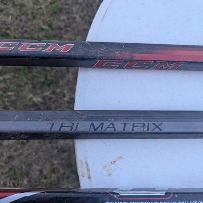 Sale Photo Thumbnail #298: HOCKEY STICKS  the table is not included.