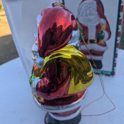 Sale Photo Thumbnail #306: Metallic Ceramic Santa figurine  see photos for size.  it might be a little bigger than you expect,. not an ornament size more like the height of an insulated cup.