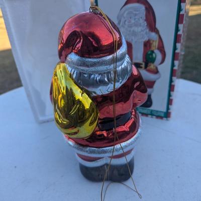 Sale Photo Thumbnail #307: Metallic Ceramic Santa figurine  see photos for size.  it might be a little bigger than you expect,. not an ornament size more like the height of an insulated cup.