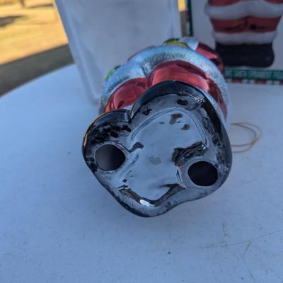 Sale Photo Thumbnail #308: Metallic Ceramic Santa figurine  see photos for size.  it might be a little bigger than you expect,. not an ornament size more like the height of an insulated cup.