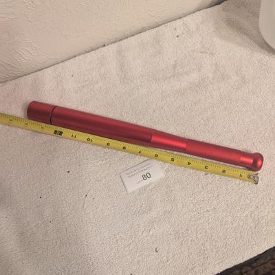 Sale Photo Thumbnail #472: 14 inch long bat shaped red metal flashlight