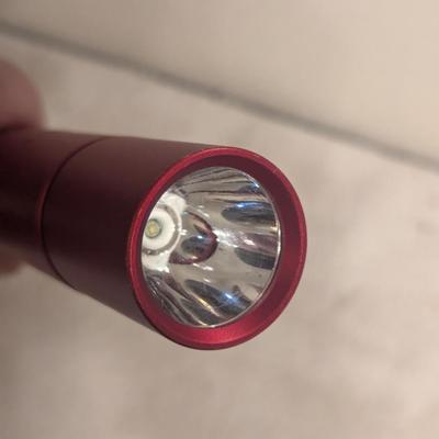 Sale Photo Thumbnail #474: 14 inch long bat shaped red metal flashlight