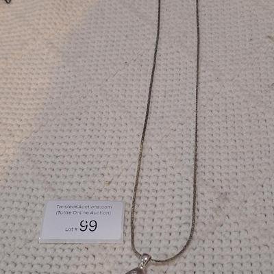 Sale Photo Thumbnail #590: Necklace- long necklace, silver tone with pendant